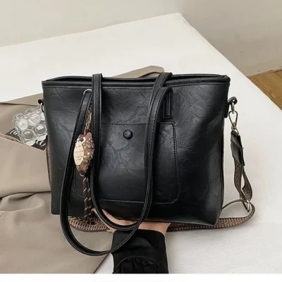 Sac bandoulière / porté épaule vintage  à triple compartiments